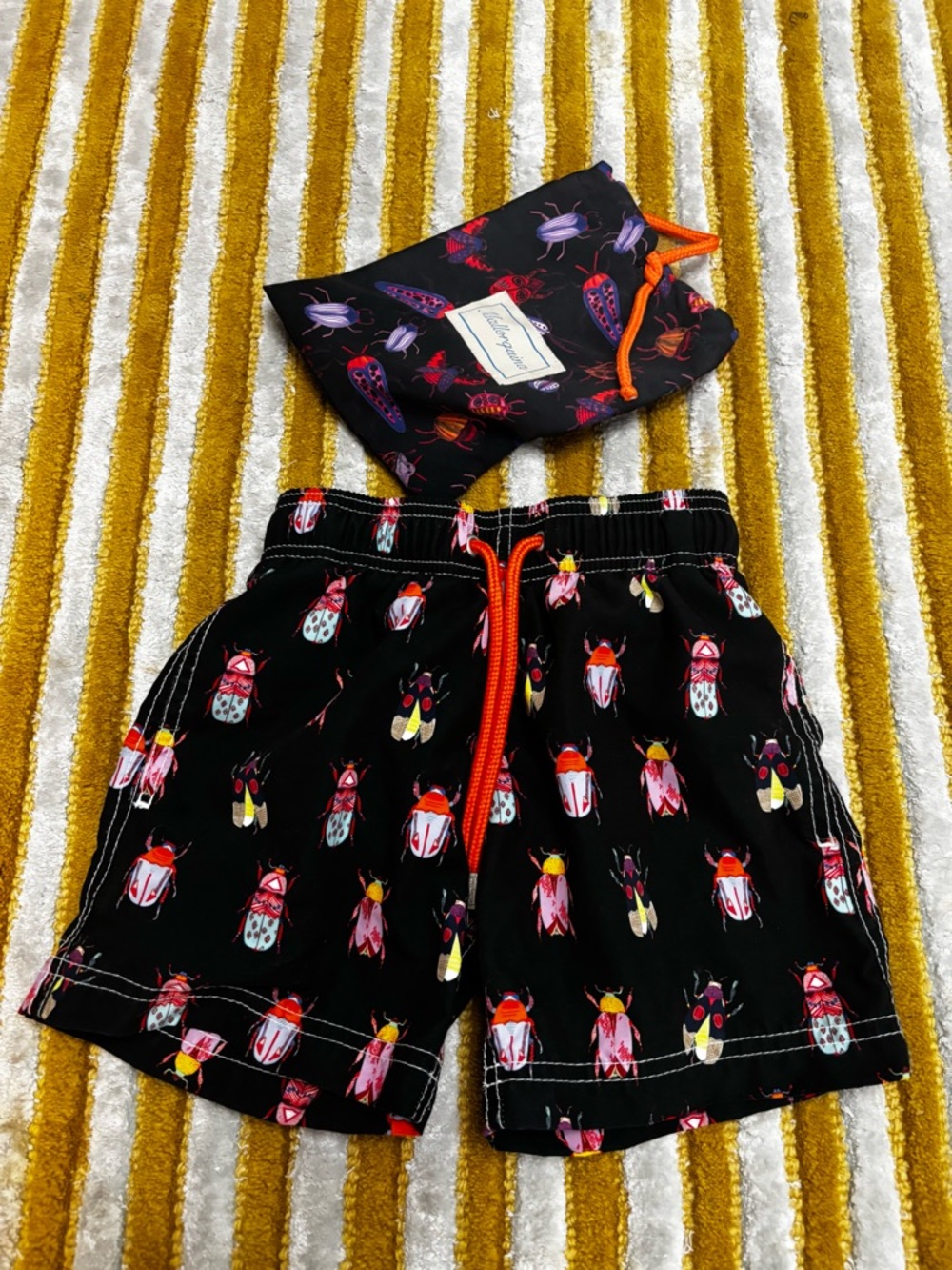 Black Beetle-Print Toddler Boy Swim Shorts with Orange Drawstring